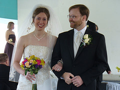 Janelle and Dabe walking down the aisle